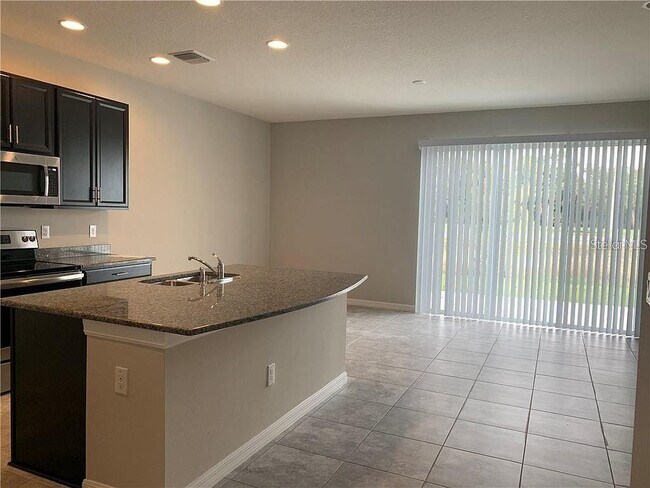 Foto del edificio - 7042 Grand Elm Dr