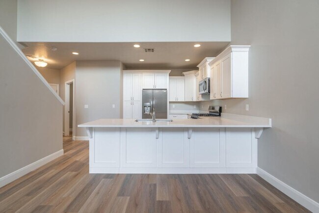 Building Photo - BRAND NEW HURRICANE TOWNHOME - END UNIT
