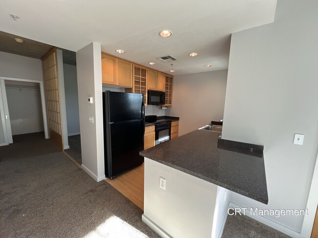 Building Photo - Charming 1 Bed, 1 Bath Condo Available in ...