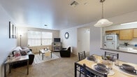 Located at 111 Honeysuckle Ct in Bloomsburg, PA, this single-floor unit offers four bedrooms, three bathrooms, and a thoughtfully arranged layout that maximizes functionality. The open-concept living and dining area serves as the heart of the home, with large windows allowing natural light to fill the carpeted space. The living room provides a comfortable gathering area, while the adjacent dining space offers easy access to the kitchen. The kitchen features warm oak cabinetry, ample counter space, and tile flooring, providing a practical and inviting cooking environment. Three full bathrooms are distributed throughout the unit, each with tile flooring and tub-shower combinations. The four bedrooms are carpeted and each includes window access to natural light, making them well-suited as private living and study spaces. Five closets are spread throughout the unit, offering generous storage options. A dedicated laundry room adds everyday convenience. A central hallway connects the bedrooms and bathrooms, contributing to a practical flow throughout the unit. The clean, neutral color palette and consistent finishes give the space a cohesive and welcoming character throughout.