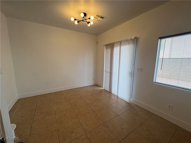 Building Photo - 8690 Horizon Wind Ave