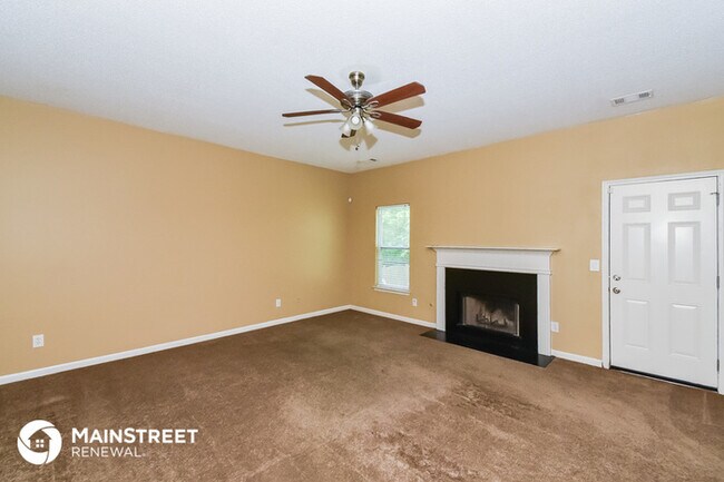 Building Photo - 7416 Petal Pl