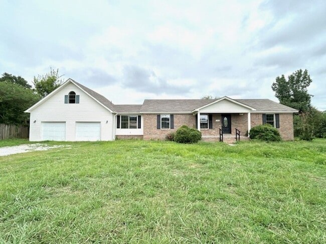 Building Photo - Spacious 4-Bedroom Home with Bonus Suite i...