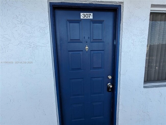 Building Photo - 8540 N Sherman Cir