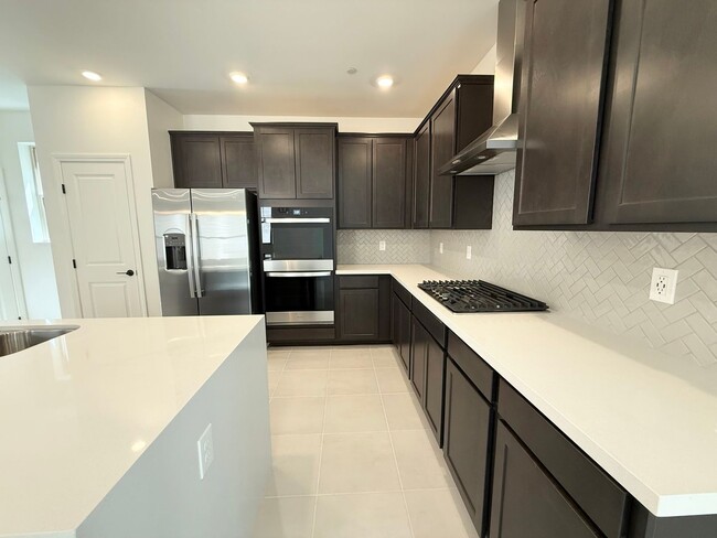 Building Photo - Modern Brand New 4-Bedroom Retreat with Loft, Balcony & Mountain Views