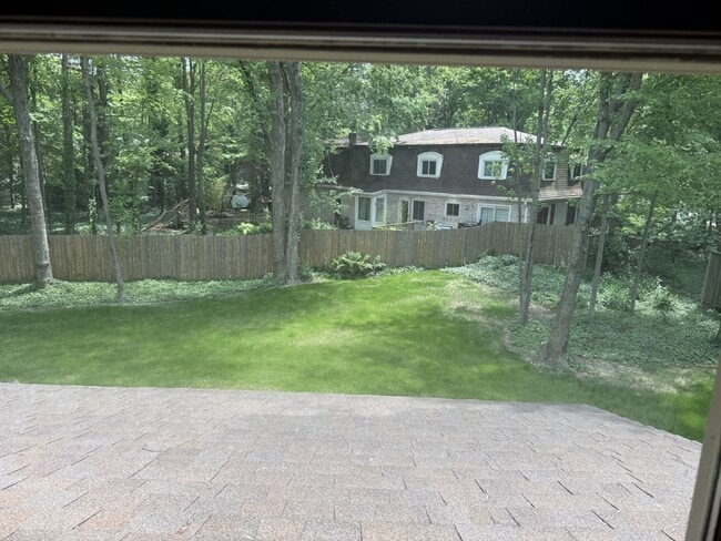 Building Photo - Spacious 4-Bedroom Home in a Peaceful Neig...
