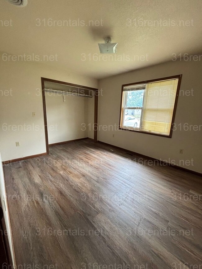 Building Photo - Three bed two bath house available now!