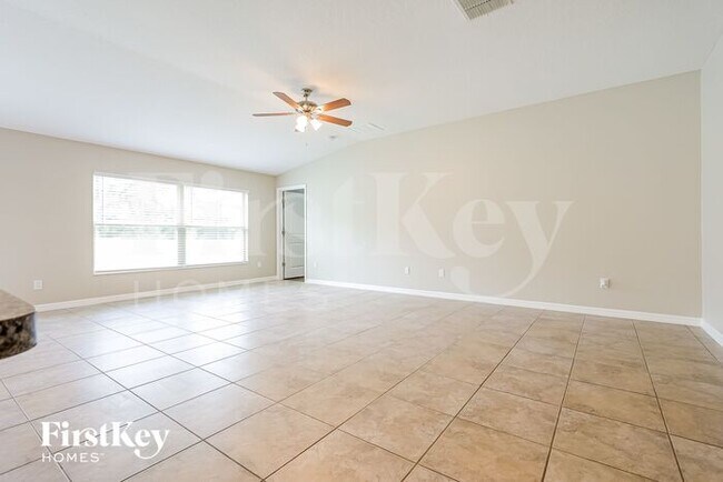 Building Photo - 10606 Strawberry Tetra Dr