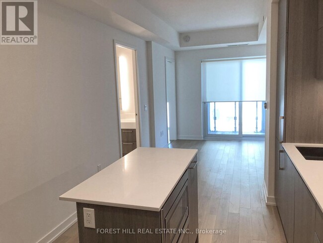 Photo du bâtiment - 1-1401 Yorkville Ave