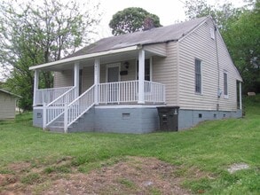 Building Photo - 1402 Harrison Ave