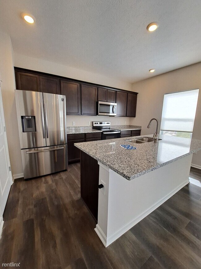 Foto del edificio - 4 br, 2.5 bath House - 5160 Buttercup Dr