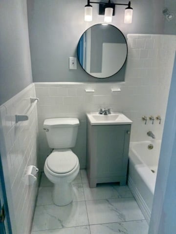Newly Updated Bathroom with vanity, mirror and lighting - 4008 Hilton Rd