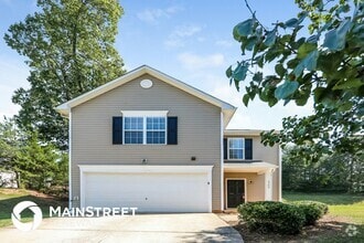 Building Photo - 5206 Carriage Woods Dr