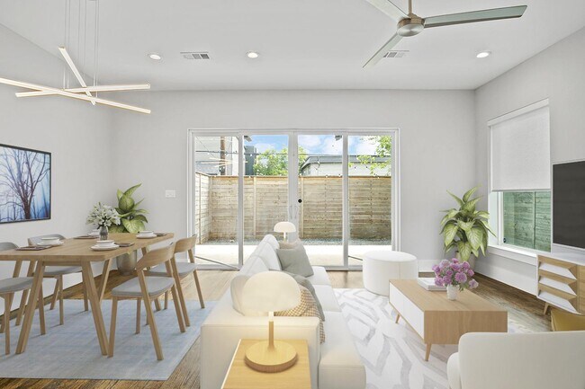 Building Photo - Modern Oak Lawn townhome with fenced yard ...