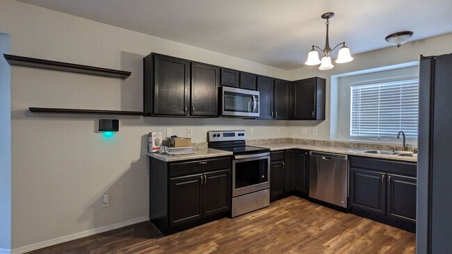 Building Photo - RANCH 4 BED/2 BATH WITH FINISHED BASEMENT AND 2 CAR GARAGE!