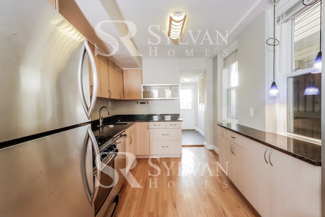 Building Photo - Enjoy living the good life in this 2 bedroom, 1.5 bathroom townhome