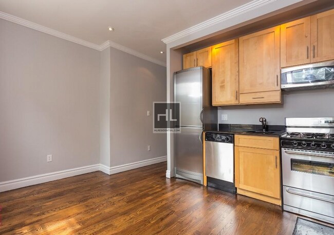 Building Photo - Bright Nolita 3-Bedroom with Skyline Views