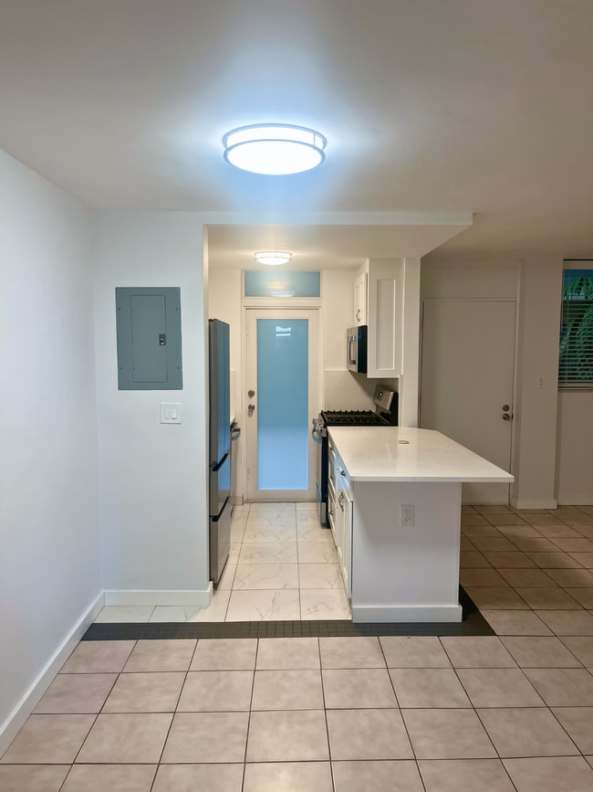 Kitchen door leads to fire exit - 921 Jefferson Ave