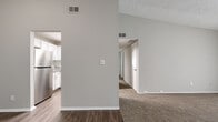 Located at 2810 De Mel Ave. in Louisville, KY, this single-story, 3-bedroom, 2-bathroom home offers a functional and well-appointed layout. The living room is a comfortable gathering space featuring plush carpeting, a ceiling fan, and a large sliding glass door fitted with vertical blinds that invites natural light into the room. The kitchen stands out with its crisp white shaker-style cabinetry, granite countertops, subway tile backsplash, stainless steel appliances including a refrigerator and dishwasher, and durable hardwood-style flooring — a clean and modern aesthetic throughout. A hallway connects the living areas to the three bedrooms, each finished with soft wall-to-wall carpeting and neutral-toned walls. The primary bedroom offers generous space, while the additional bedrooms include windows with blinds providing natural light. Both bathrooms are outfitted with granite-topped vanities featuring white cabinetry and brushed nickel hardware, with hardwood-style flooring and tub/shower combinations. Textured ceilings carry throughout the home, and the neutral color palette creates a cohesive, move-in-ready atmosphere. The layout efficiently maximizes the available space, making this home a practical and comfortable option in the Louisville area.