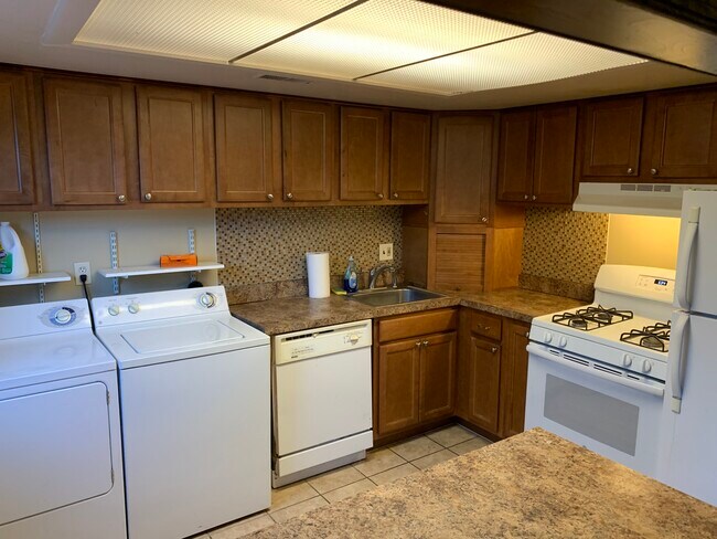 All appliances and gas stove included. - 1141 W Aaron Dr