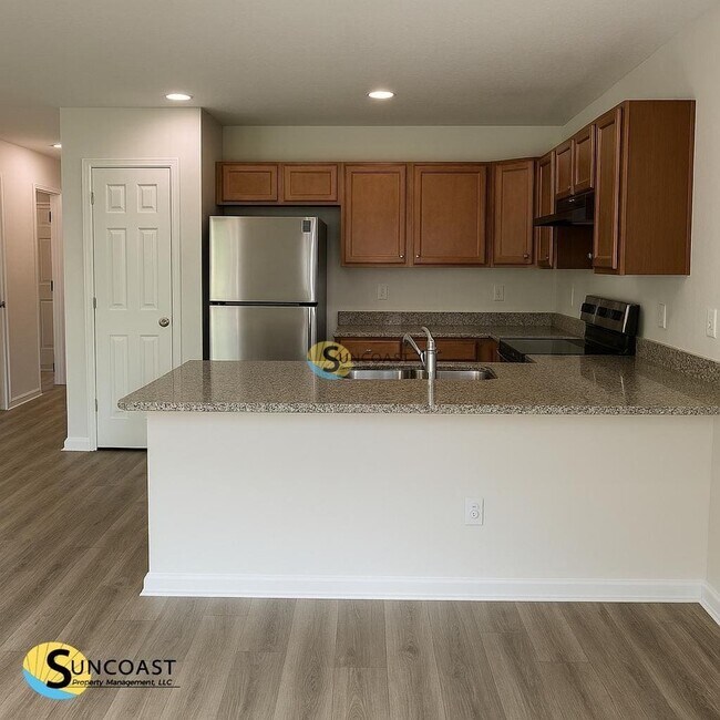 Foto del edificio - 7622 Rain Forest Dr N