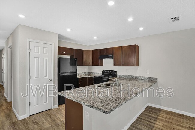 Foto del edificio - 9820 Morgan Marsh Ct