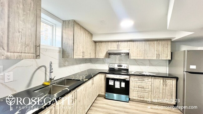 Building Photo - Newly Renovated 2-Bedroom Basement Unit in...