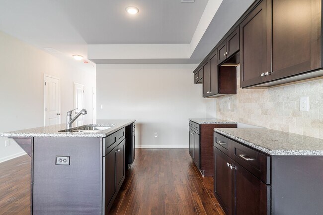 Building Photo - Modernistic 3 bed 2.5 bath Townhome in Jon...