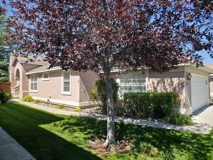 Primary Photo - 2-Bedroom, 2-Bath + Den Single-Family Home...