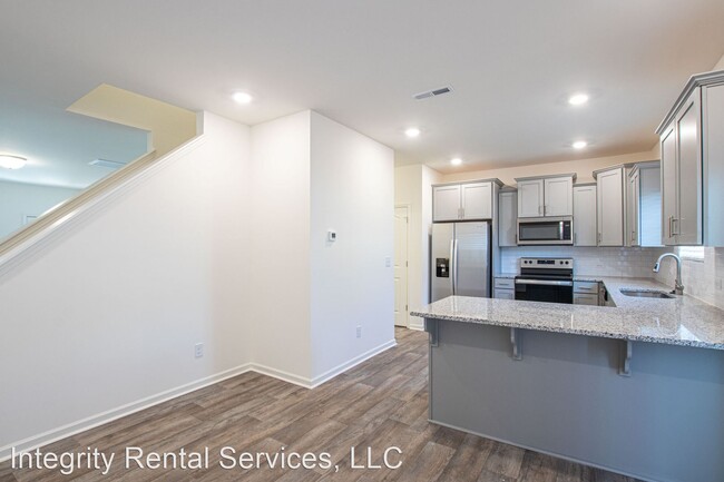 Building Photo - 3 br, 2.5 bath House - 7014 Duncan Acres D...