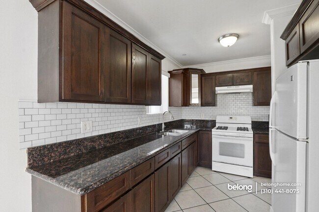 Foto del edificio - 1616 W 39th Pl