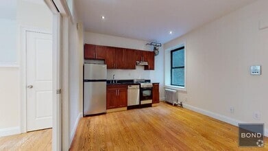 Building Photo - 207-209-209 W 11th St