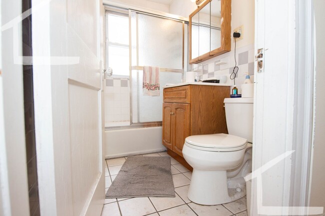 Photo - No Brokers Fee, Top Floor Unit, Porch, Laundry, Steps from the T Stop Apartment