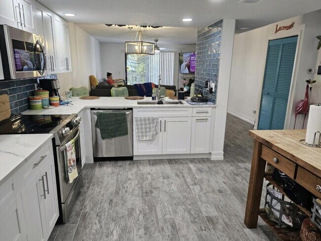 Building Photo - "Discover Coastal Comfort: Spacious 2-Bed,...