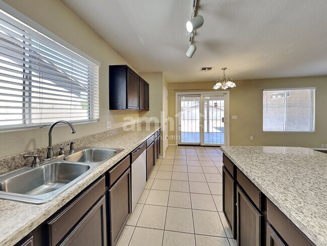 Building Photo - 5895 E Tercel Dr