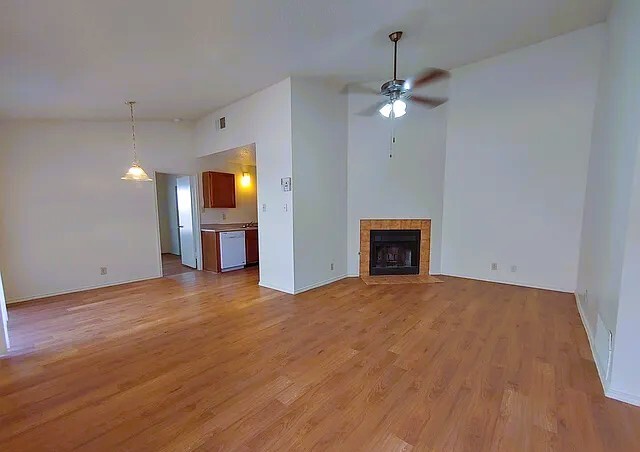 Livingroom with Fireplace and Ceiling Fan - 9831 Ardash Ln