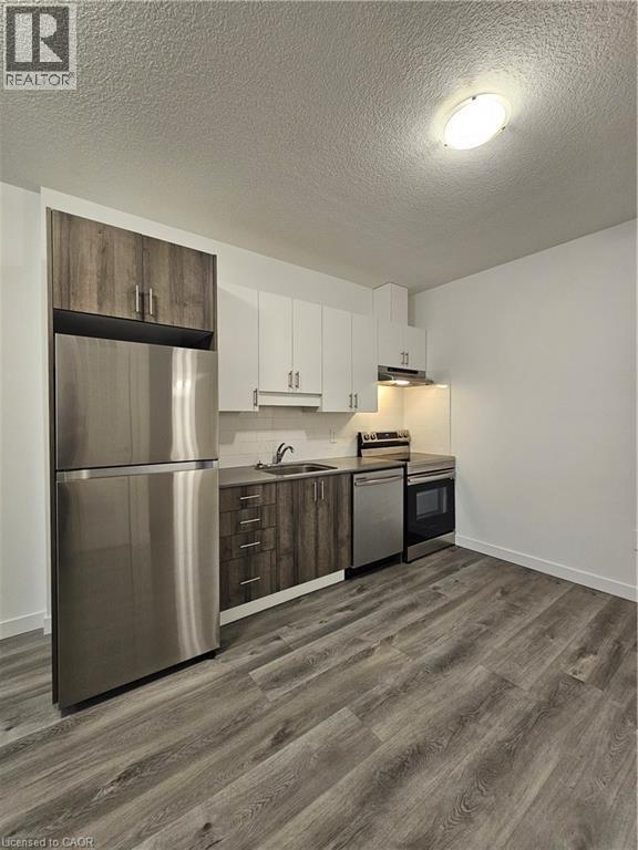 Photo du bâtiment - 1434 Highland Rd W
