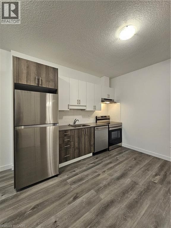 Photo du bâtiment - 1434 Highland Rd W