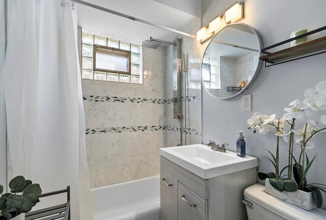 Building Photo - Upscale Living at Its Finest