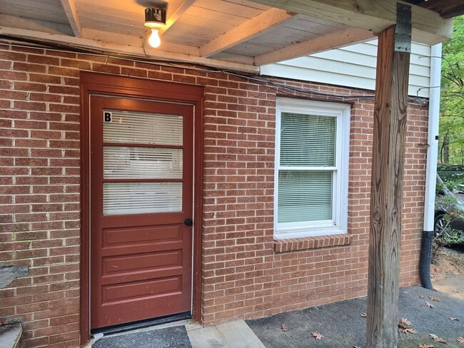 Building Photo - This Basement Retreat Might Be Your Perfect Match - Utilities Included!