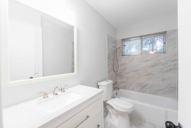 Building Photo - Gena Properties investment LLC -Garland