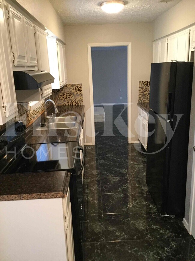 Foto del edificio - 5506 Maplegate Dr