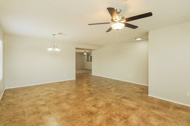 Building Photo - 5878 E Cedarbird Dr