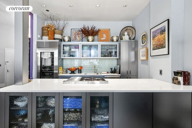 Foto del edificio - 114-116 E 13th St