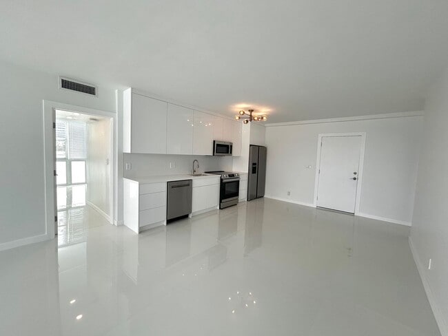 Building Photo - Fully Renovated East-Facing 2BR/2BA + Bonus Room | Ocean Views | In-Unit W/D