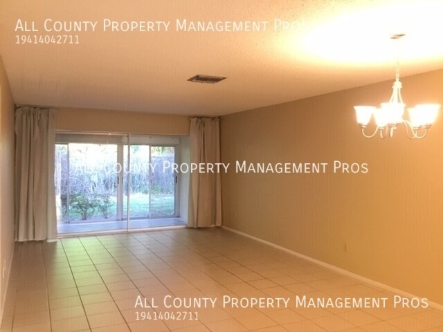 Building Photo - 7060 W Country Club Dr N