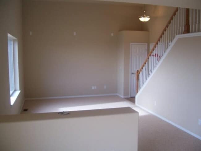 Building Photo - Wonderful two level home with an unfinishe...