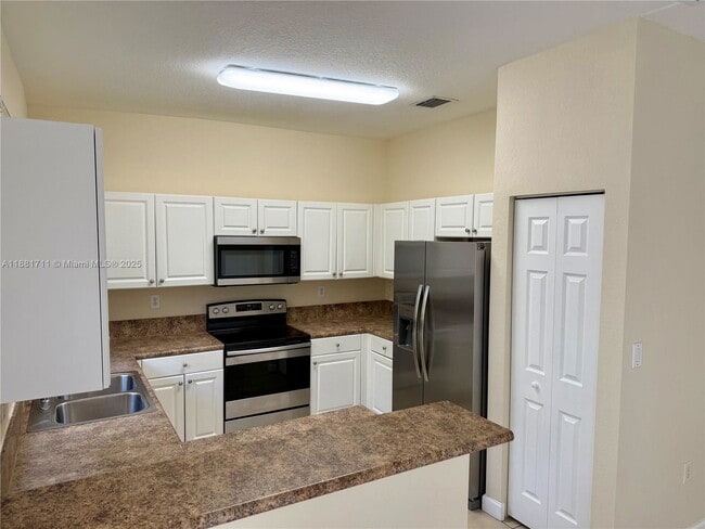 Building Photo - 13225 SW 128th Path