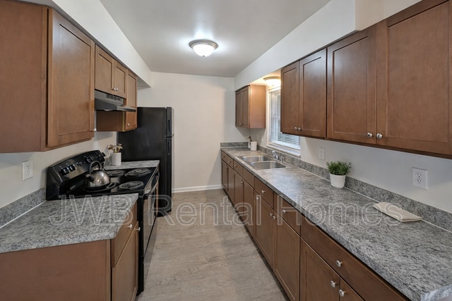 Building Photo - 6189 Checkmate Ln