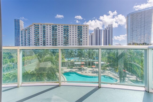 Building Photo - 19380 Collins Ave
